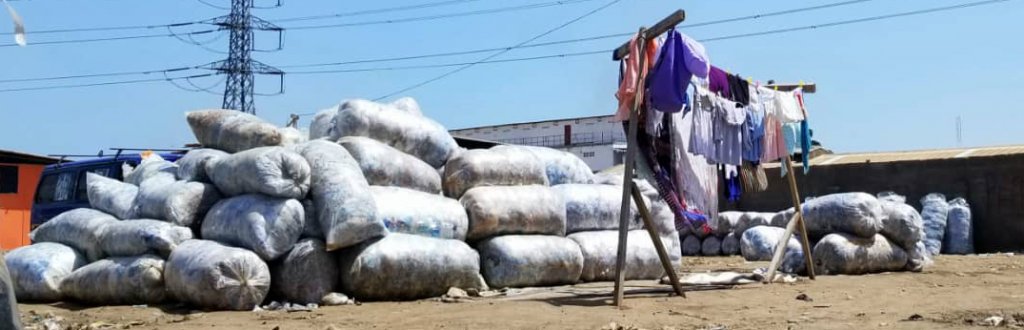 Bags of plastics for recycling await collection in Greater Accra (photo credit: Dr. Mawuli Dzodzomenyo, University of Ghana)